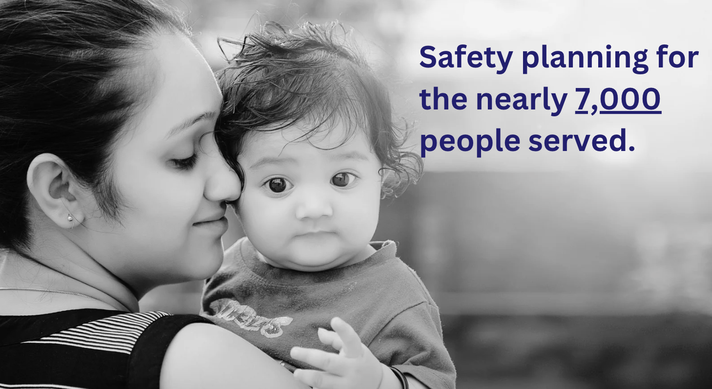 Safety planning for the nearly 7,000 people served. Woman holding a young child.